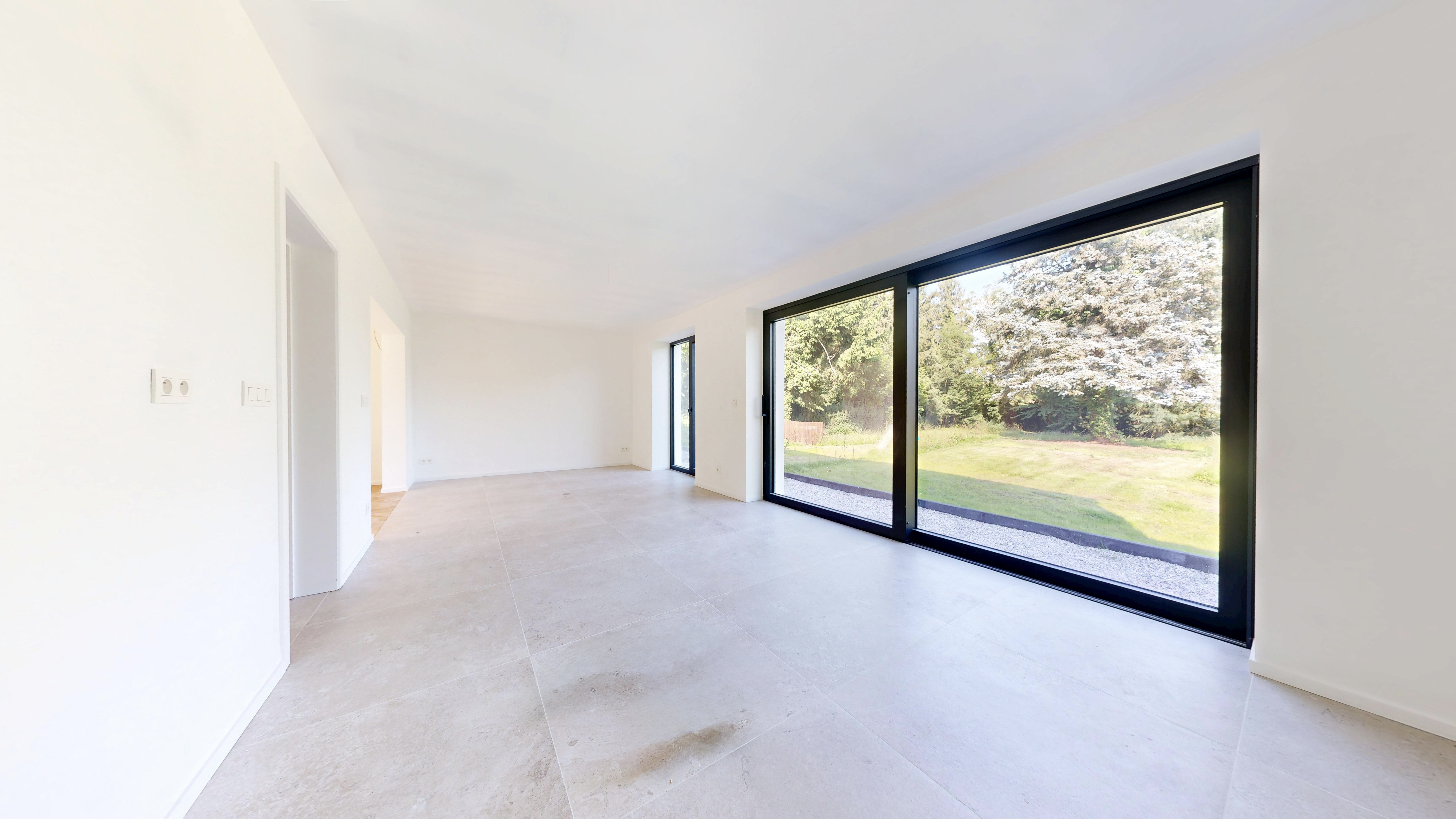 Superbe maison neuve 4ch dans un cadre verdoyant et calme. Photo 5