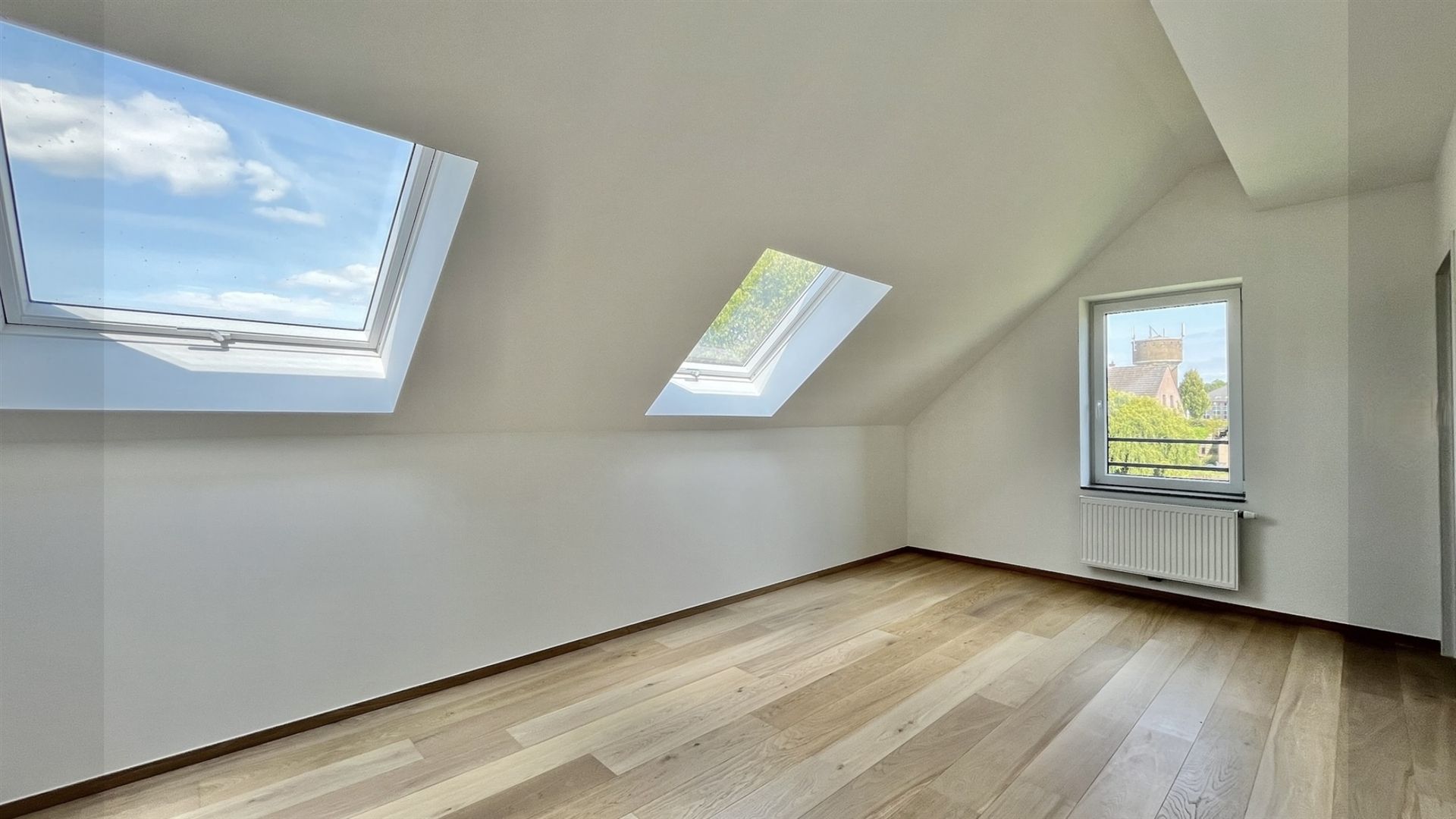 Duplexwoning van 200 m2 met grote zolder en parkeerplaats. Photo 11