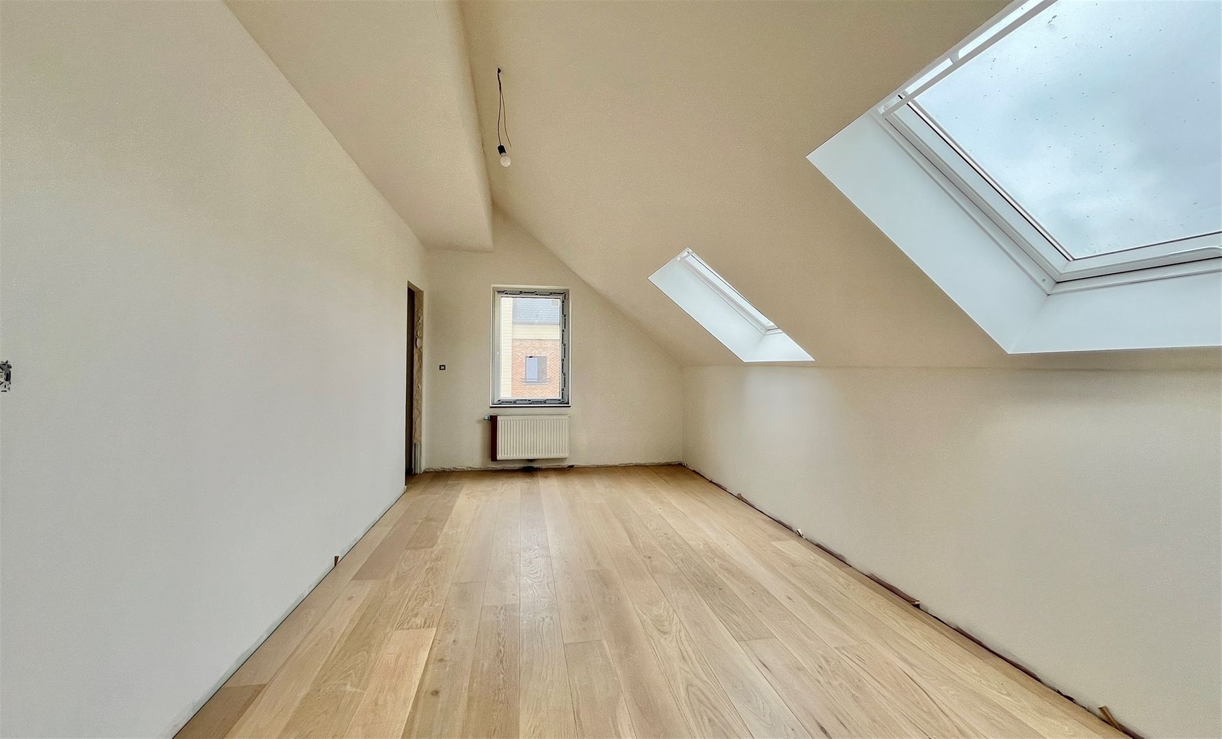 Incroyable duplex de 217 m2 avec vaste grenier et parking Photo 6